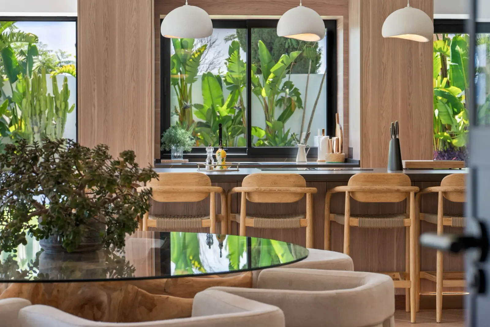 Oak kitchen and dining space with garden views