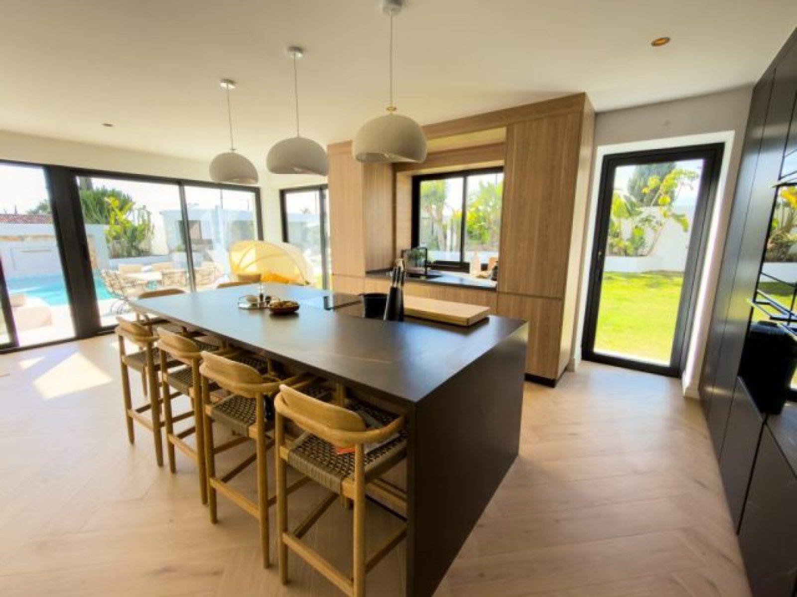 Bespoke kitchen with island and garden view