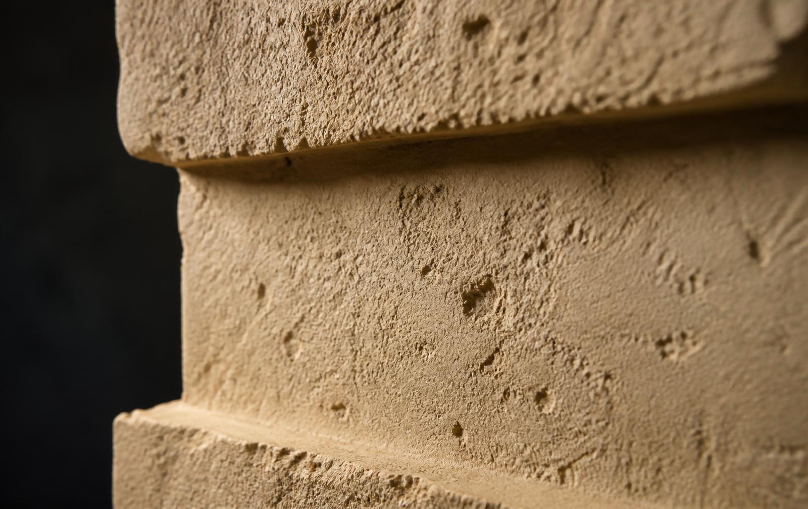 Macro detail of hand-finished limestone